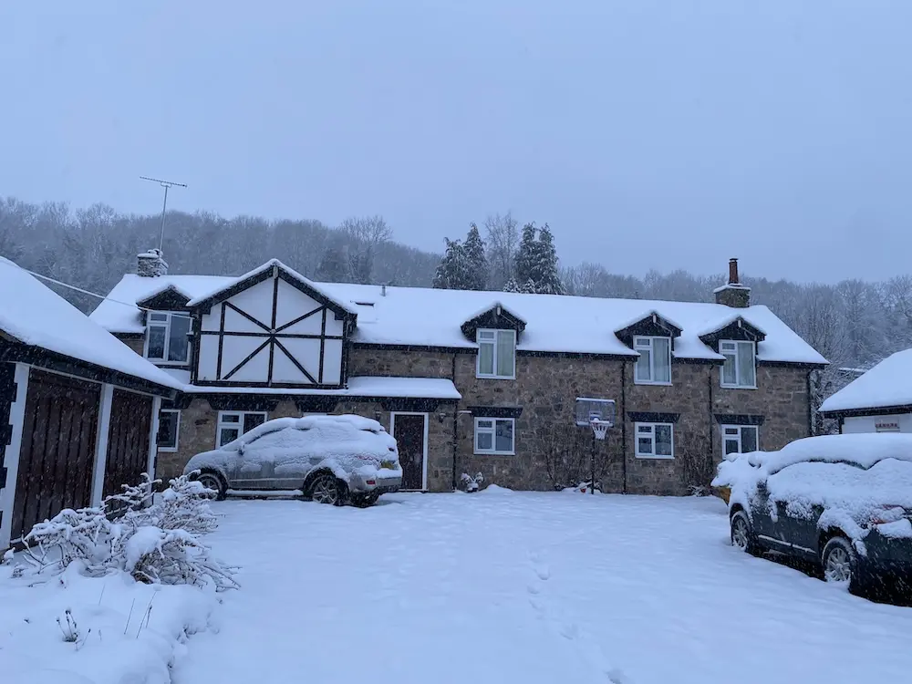 The front of our house, covered in snow