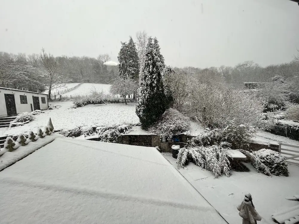 The back of our house, covered in snow