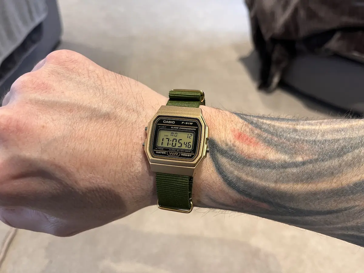 Gold F-91W on a green nato strap