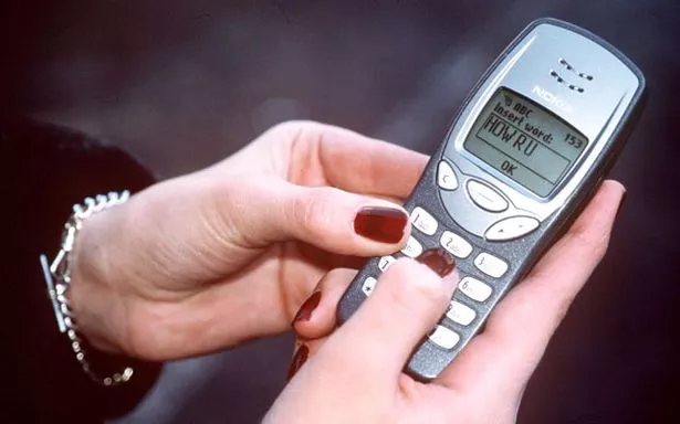 Sending a text on a 90s Nokia